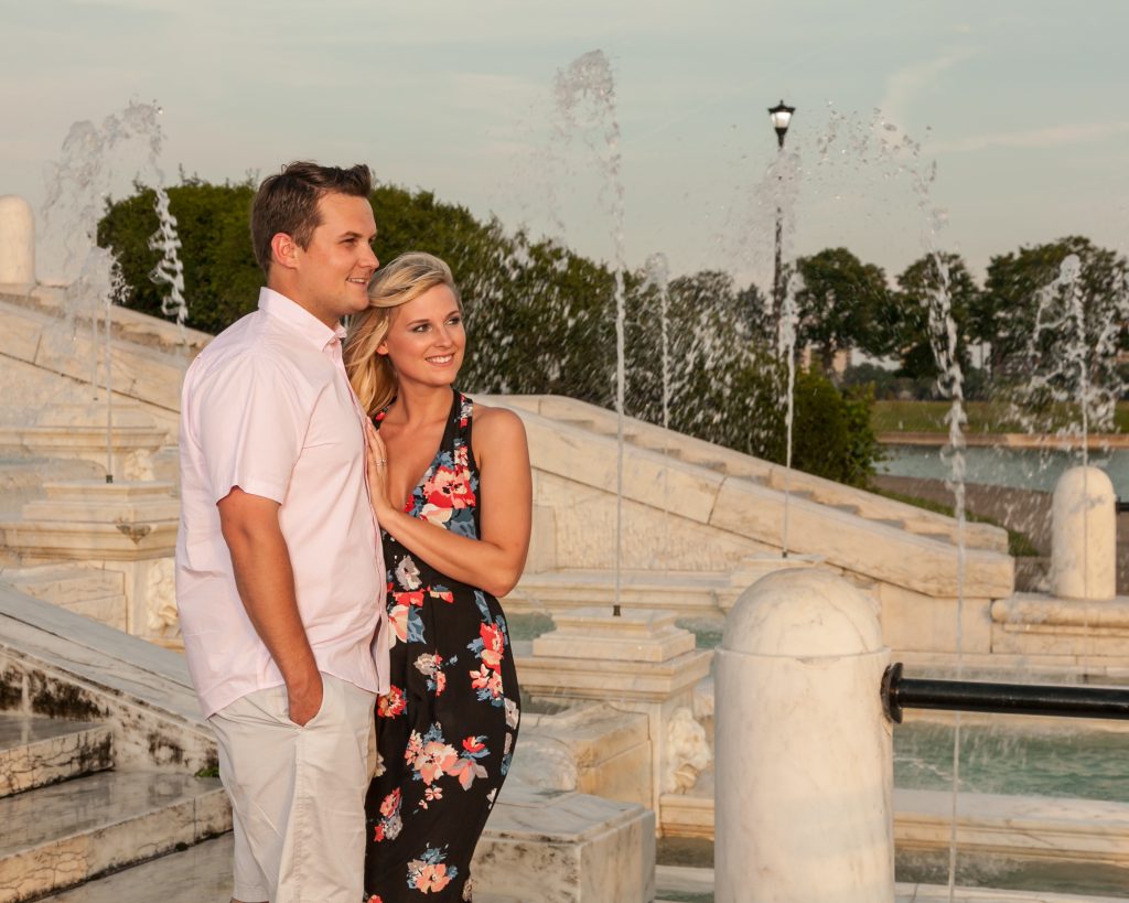 photo of engaged couple at Belle Isle by the fountain